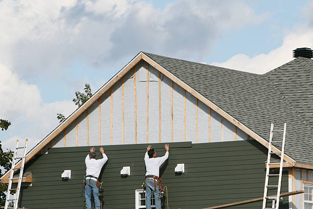 Professional Emergency Siding Repair technician working in Firestone, CO